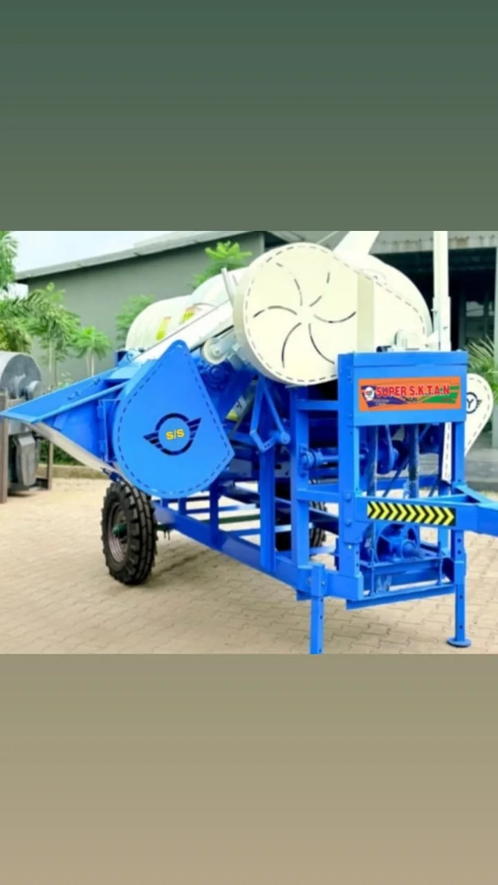 Blue wheeled thresher machine