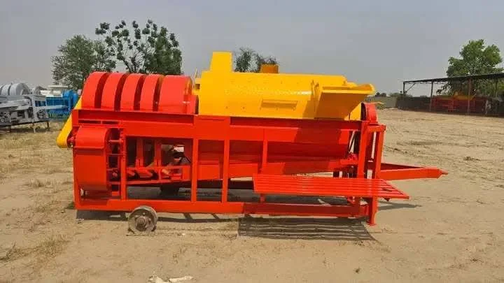 Orange thresher machine outdoors